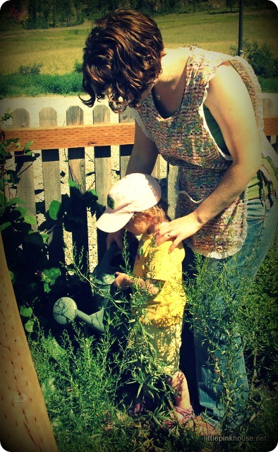 watering her carrot