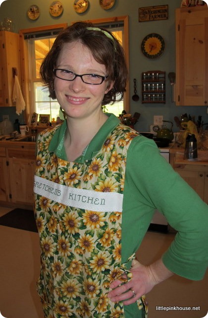 in my sunflower kitchen wearing my sunflower apron