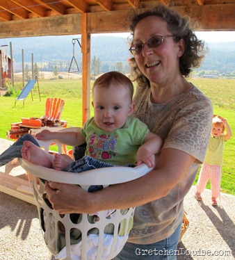 Mary ridin' in the laundry basket with Aunt Margie